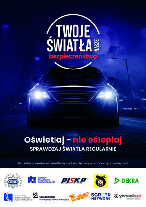 Plakat akcji, auto frontem do obiektywu, włączone światła, partnerzy i hasła akcji.